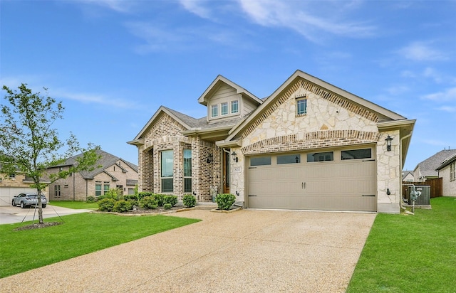 801 Dove Haven Ln, Melissa, TX 75454 - view of front of home featuring stone siding, driveway, and an attached garage