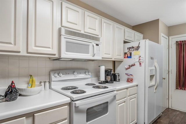 1202 Rice Rd Unit 122, Tyler, TX 75703 - kitchen featuring white appliances, white cabinetry, and decorative backsplash