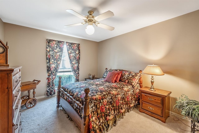 1202 Rice Rd Unit 122, Tyler, TX 75703 - bedroom with light colored carpet, baseboards, and a ceiling fan
