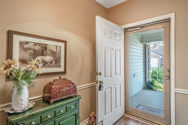 1202 Rice Rd Unit 122, Tyler, TX 75703 - foyer entrance with ornamental molding and wood finished floors