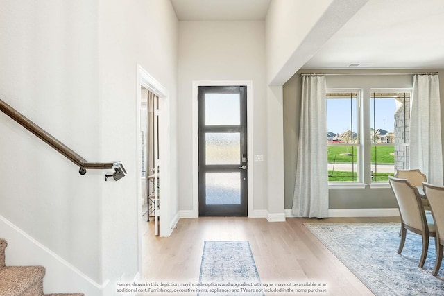 4410 Biscayne Dr, Midlothian, TX 76065 - entryway featuring wood finished floors, stairway, and baseboards