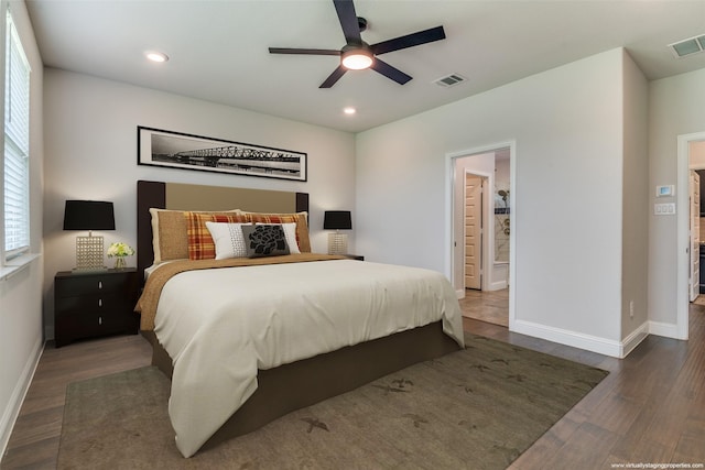 1110 Howley Ct, Forney, TX 75126 - bedroom featuring wood finished floors, baseboards, recessed lighting, connected bathroom, and a ceiling fan