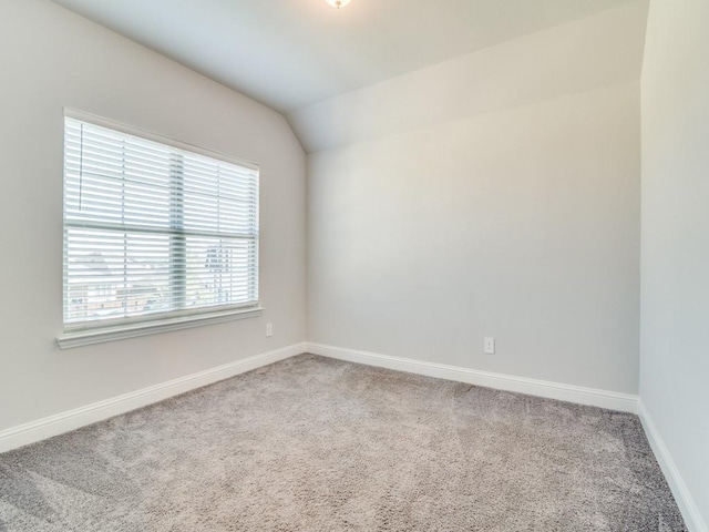 1110 Howley Ct, Forney, TX 75126 - carpeted spare room with baseboards and vaulted ceiling
