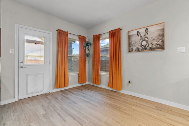 15712 Oak Pointe Dr, Fort Worth, TX 76177 - spare room with wood finished floors and baseboards