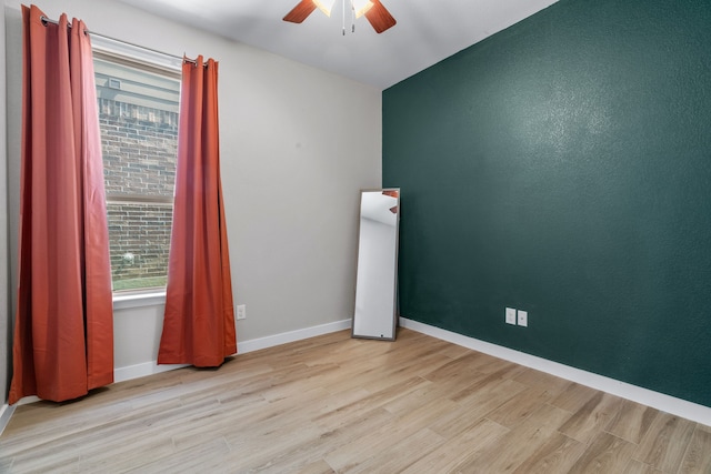 15712 Oak Pointe Dr, Fort Worth, TX 76177 - empty room with ceiling fan, wood finished floors, and baseboards