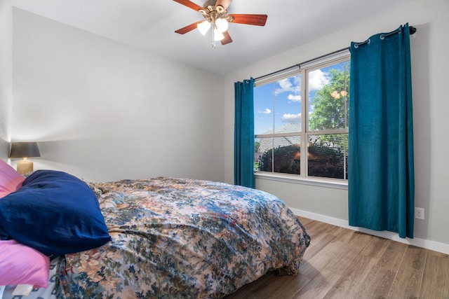 15712 Oak Pointe Dr, Fort Worth, TX 76177 - bedroom featuring wood finished floors, baseboards, and a ceiling fan