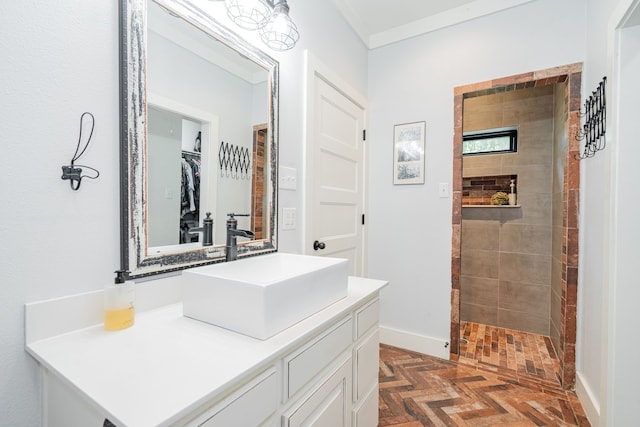 853 County Road 2215, Decatur, TX 76234 - bathroom with vanity, tiled shower, baseboards, and a spacious closet