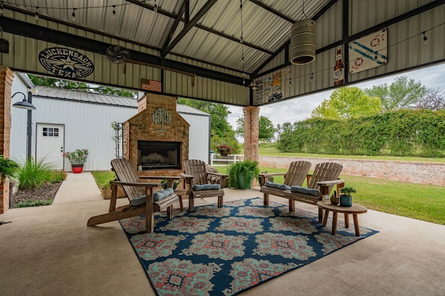 853 County Road 2215, Decatur, TX 76234 - view of patio with an outdoor brick fireplace