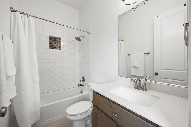 2012 Grover Ln, Rockwall, TX 75087 - full bathroom featuring vanity, shower / tub combo with curtain, toilet, and tile patterned floors