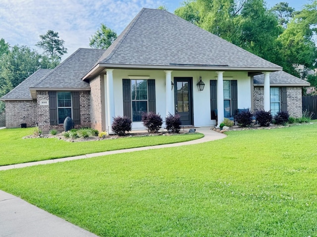 4101 Periwinkle Ln, Benton, LA 71006 - view of front of property with brick siding, a shingled roof, a front yard, and a porch