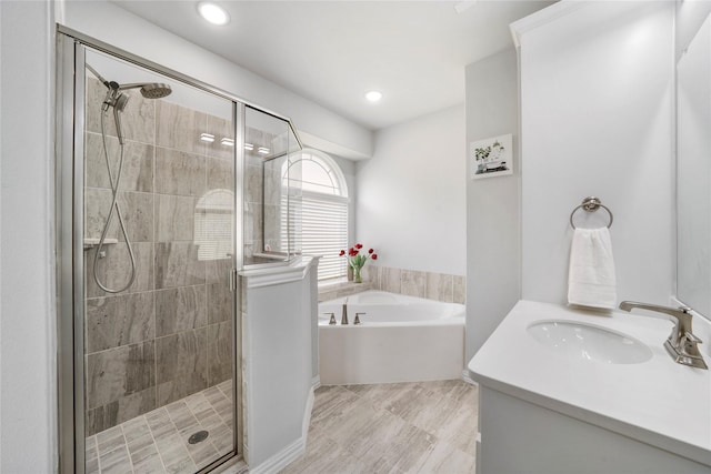 1708 Ordonez Dr, Little Elm, TX 75068 - full bath with a garden tub, a stall shower, vanity, and recessed lighting
