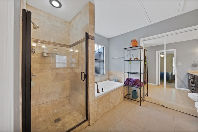 4301 Jenning Ct, Plano, TX 75093 - bathroom featuring a garden tub, a stall shower, tile patterned flooring, and vanity