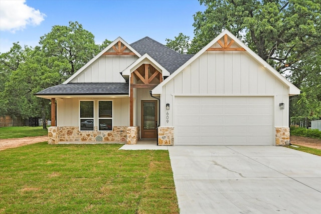 609 N Stewart St, Azle, TX 76020 - modern inspired farmhouse featuring a shingled roof, stone siding, driveway, board and batten siding, and a garage