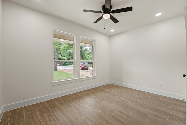 609 N Stewart St, Azle, TX 76020 - unfurnished room with light wood-style floors, ceiling fan, baseboards, and recessed lighting