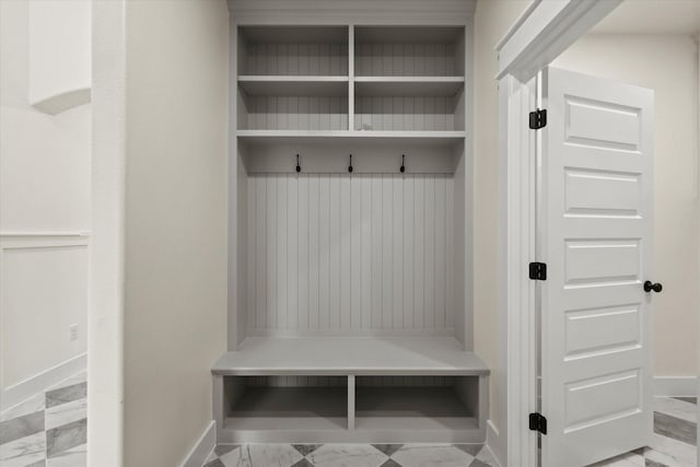 609 N Stewart St, Azle, TX 76020 - mudroom featuring baseboards and marble finish flooring