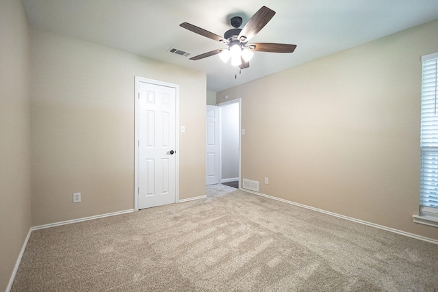 4701 Woodview St, Arlington, TX 76013 - unfurnished bedroom with carpet flooring, baseboards, and a ceiling fan