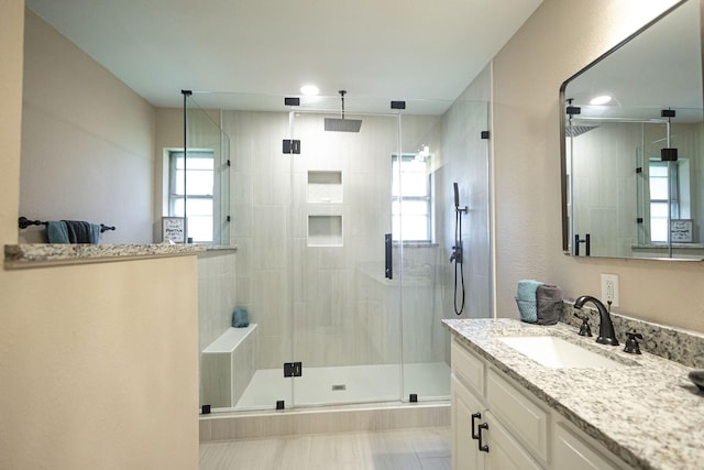 4701 Woodview St, Arlington, TX 76013 - full bathroom with vanity, a stall shower, and recessed lighting