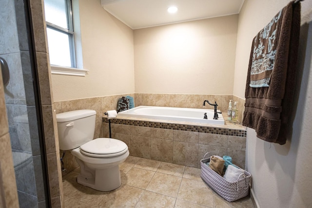 4701 Woodview St, Arlington, TX 76013 - bathroom with toilet, a bath, and tile patterned floors