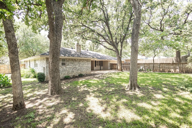 4701 Woodview St, Arlington, TX 76013 - view of yard with a patio