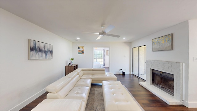 903 Turtle Lake Blvd Unit 268, Irving, TX 75060 - living room with baseboards, dark wood-style flooring, ceiling fan, a fireplace, and recessed lighting