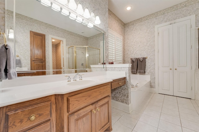 808 Country Club Dr, Heath, TX 75032 - full bathroom with tile patterned floors, vanity, a garden tub, a shower stall, and wallpapered walls