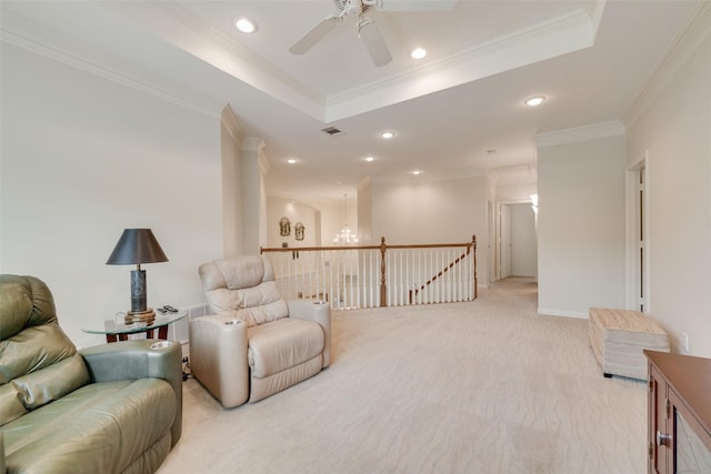 808 Country Club Dr, Heath, TX 75032 - sitting room featuring an upstairs landing, a ceiling fan, crown molding, light colored carpet, and a raised ceiling