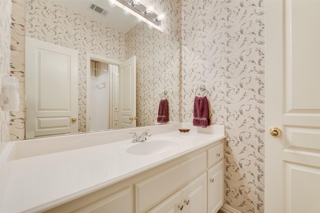 808 Country Club Dr, Heath, TX 75032 - bathroom featuring wallpapered walls and vanity