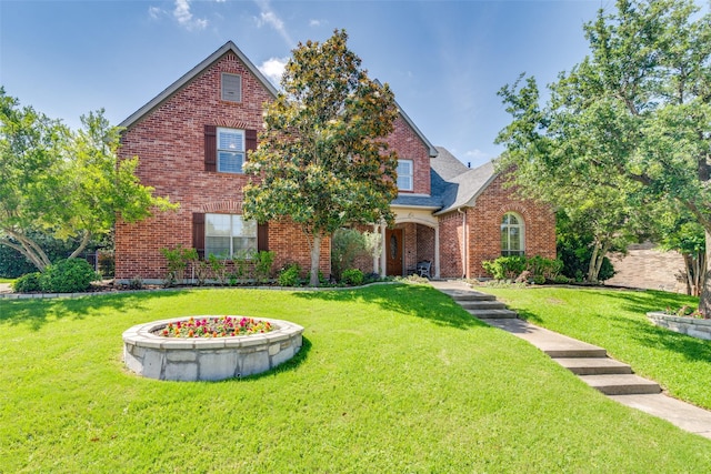 808 Country Club Dr, Heath, TX 75032 - view of front of house featuring brick siding and a front yard