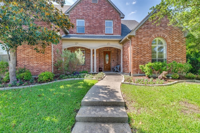 808 Country Club Dr, Heath, TX 75032 - traditional-style home featuring a front lawn, brick siding, a shingled roof, and a porch