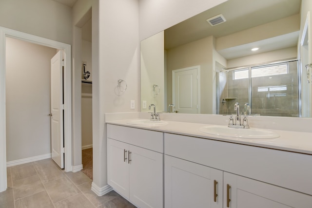 944 Linden Ct, Lavon, TX 75166 - full bathroom with double vanity, a shower stall, and baseboards