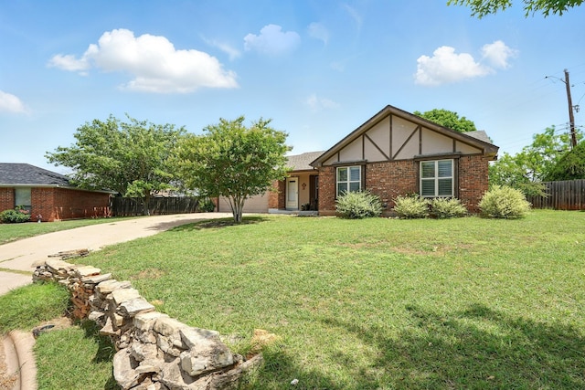 7934 Bonnie Cir, Abilene, TX 79606 - tudor house with driveway, brick siding, and stucco siding
