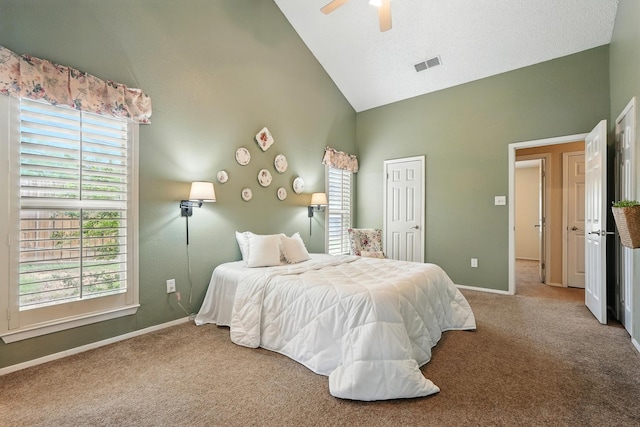 7934 Bonnie Cir, Abilene, TX 79606 - carpeted bedroom featuring multiple windows, high vaulted ceiling, baseboards, and a ceiling fan