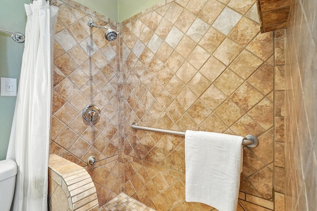 7934 Bonnie Cir, Abilene, TX 79606 - bathroom featuring tiled shower and toilet