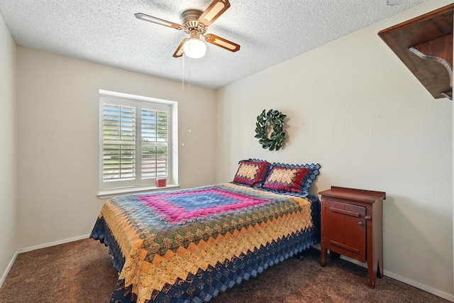 7934 Bonnie Cir, Abilene, TX 79606 - carpeted bedroom featuring a textured ceiling, baseboards, and ceiling fan