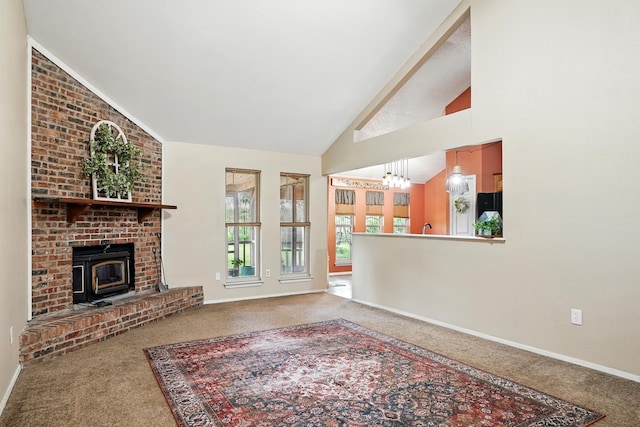 7934 Bonnie Cir, Abilene, TX 79606 - unfurnished living room featuring carpet flooring, baseboards, a chandelier, and high vaulted ceiling