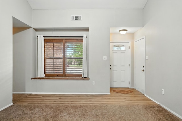 7934 Bonnie Cir, Abilene, TX 79606 - carpeted foyer with healthy amount of natural light and baseboards