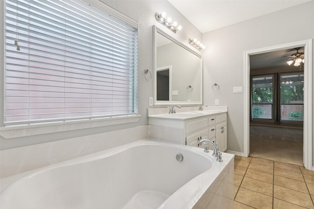 13100 Larks View Pt, Fort Worth, TX 76244 - full bath with a tub, double vanity, tile patterned floors, and ceiling fan