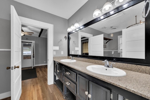 306 W Ross St, Waxahachie, TX 75165 - full bath featuring wood finished floors, double vanity, ceiling fan, and baseboards
