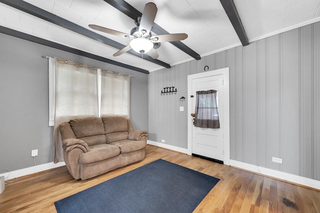 306 W Ross St, Waxahachie, TX 75165 - living room featuring beam ceiling, wood finished floors, baseboards, and a ceiling fan
