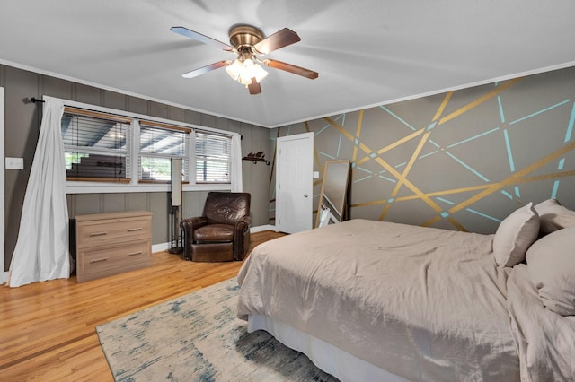 306 W Ross St, Waxahachie, TX 75165 - bedroom featuring wood finished floors, crown molding, and ceiling fan