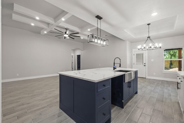 3813 Galvez Ave, Fort Worth, TX 76111 - kitchen featuring a sink, light wood-type flooring, open floor plan, baseboards, and recessed lighting
