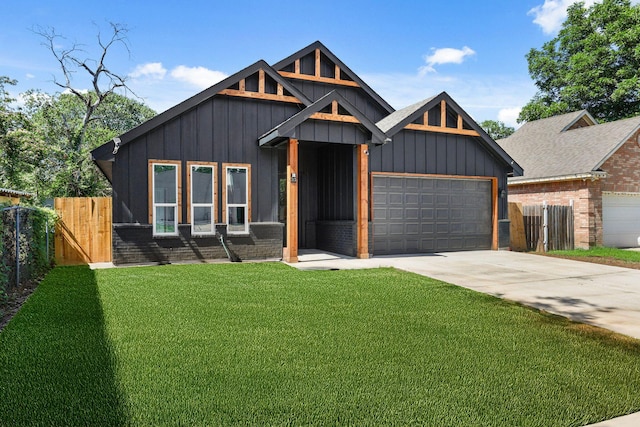 3813 Galvez Ave, Fort Worth, TX 76111 - view of front of property with a garage, board and batten siding, and concrete driveway