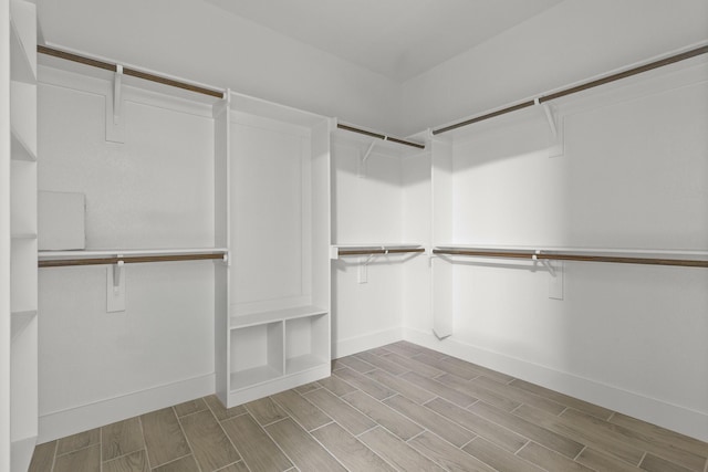 3813 Galvez Ave, Fort Worth, TX 76111 - walk in closet featuring wood finish floors