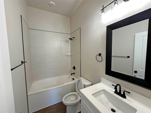 507 Magnolia Dr, Troy, TX 76579 - bathroom with toilet, vanity, tub / shower combination, and wood finished floors