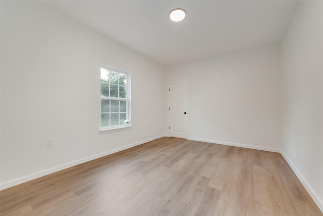 1113 Verbena St, Fort Worth, TX 76104 - unfurnished room with light wood-style floors and baseboards