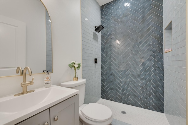 1113 Verbena St, Fort Worth, TX 76104 - bathroom with vanity, toilet, and a tile shower