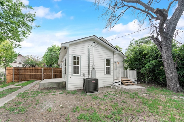 1113 Verbena St, Fort Worth, TX 76104 - back of house with central air condition unit