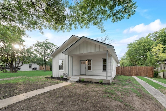 1113 Verbena St, Fort Worth, TX 76104 - bungalow-style house featuring board and batten siding and covered porch