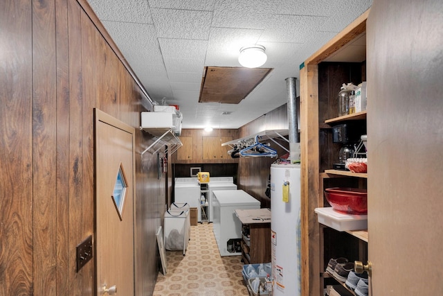 933 El Camino Rd, Waxahachie, TX 75167 - laundry room with gas water heater and washer and clothes dryer