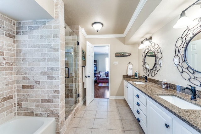 606 Kirby Ln, Richardson, TX 75080 - ensuite bathroom with crown molding, a stall shower, double vanity, tile patterned flooring, and a bathtub